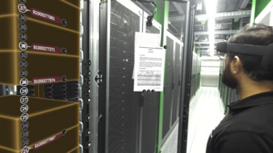 Engineer using AR to access ITSM knowledge base for troubleshooting in a data center.